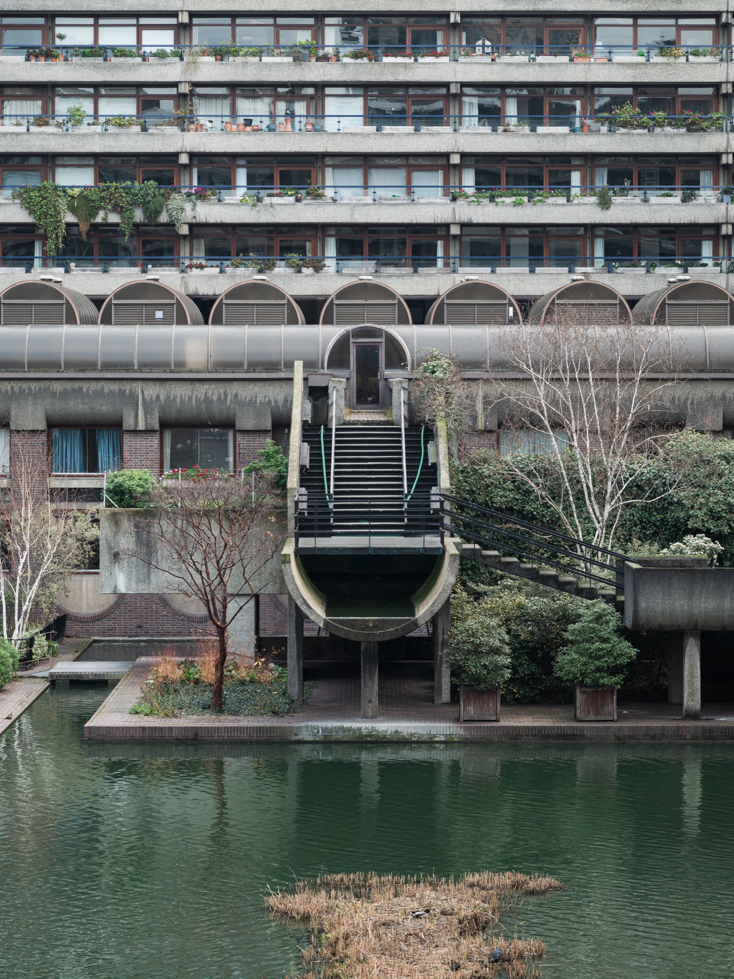 Planted balconies and a lake at the Barbican Estate in the City of London
