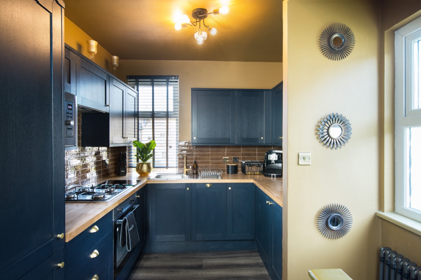 A fitted kitchen in a managed house in Leyton